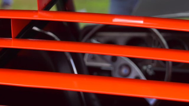 muscle car rack focus from dash through louvres 4k