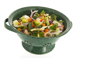 Mixed vegetables in colander