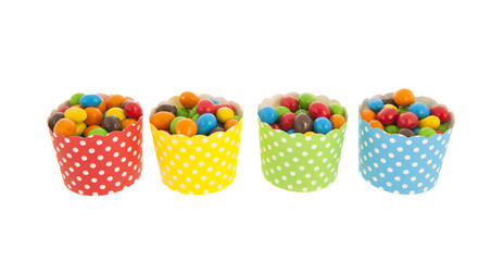 Colorful candy in cups