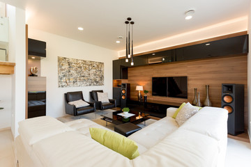 Modern living room with stereo speakers