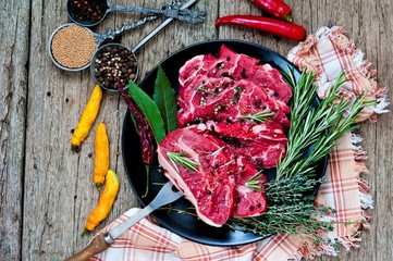 Raw beef meat with herbs and spices