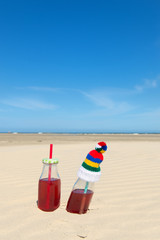 Bottles lemonade at beach