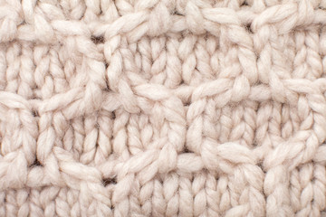 pattern, beige woolen dressing close up texture, macro photo