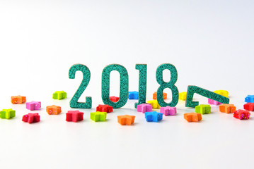 2018 New year concept. group of colorful stars around 2 0 1 8 number on white background