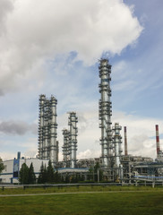 Fototapeta na wymiar Distillation columns at a petrochemical plant