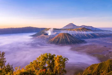 Schilderijen op glas Mountain Bromo at East Java Indonesia. This active volcano is one of the popular destination in Indonesia © Aqnus