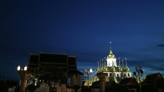 Metal castle, Loha Prasat at Wat Ratchanatdaram temple, Bangkok, Thailand at twilight night