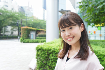 Young woman walking on street