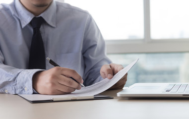 Businessman working reading documents graph financial to job succes Analyze document plans