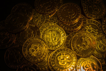 Fototapeta na wymiar The golden Bitcoins virtual currency coin image idea for such as background.