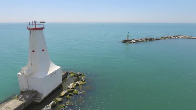 aerial lighthouse fly by in the sun 4k