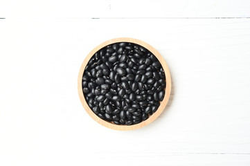 Black beans in wooden bowl