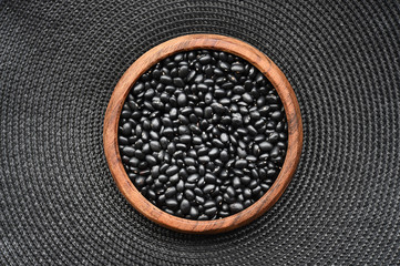 collection of different legumes in wooden bowl