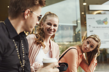 Young two gender people together enjoing and getting fun in the city