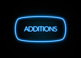 Additions  - colorful Neon Sign on brickwall