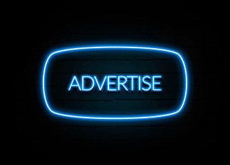 Advertise  - colorful Neon Sign on brickwall