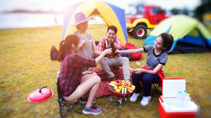 Group of Young Asian Camper Enjoy Camping Outdoors . Holiday , vacation , summer concept .