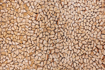 Wooden background of shattered tree trunks