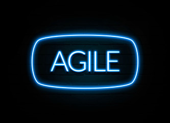 Agile  - colorful Neon Sign on brickwall