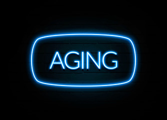 Aging  - colorful Neon Sign on brickwall