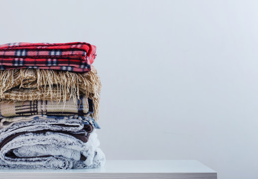 pile of blankets on a white background