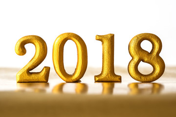 The Golden Number 2018 placed on dark elegant glamour night tone background for new year 2018 celebration concept