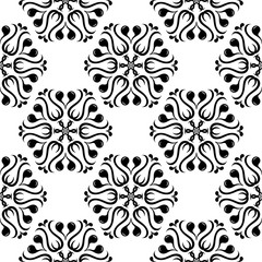 Black flowers on white background. Ornamental seamless pattern