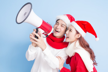 couple smile with merry christmas