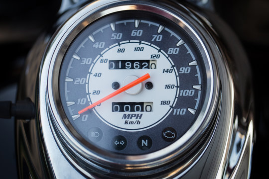 Color detail with the speedometer of a motorcycle.