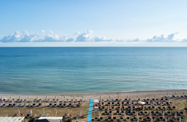 aerial view of parasols and beachline in Marotta. For travel and holiday concepts