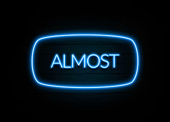 Almost  - colorful Neon Sign on brickwall