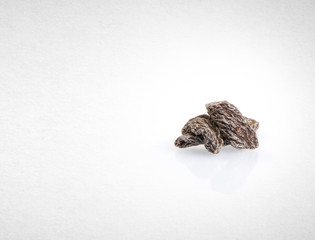 Dried salted peach or Chinese dried plum on a background.