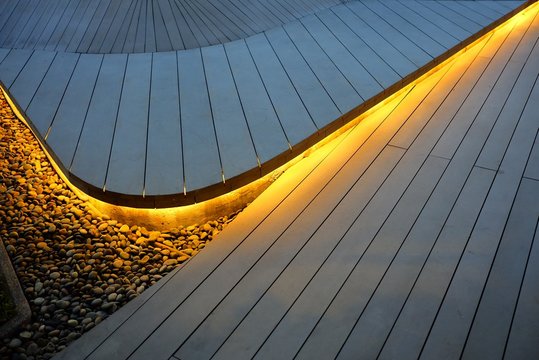 Top View of Illuminated Wooden Stair Background.