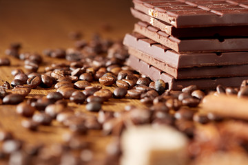Aroma coffee chocolate cookies and spices on the wooden table. Dark wooden background. Top view. Close. Closeup.