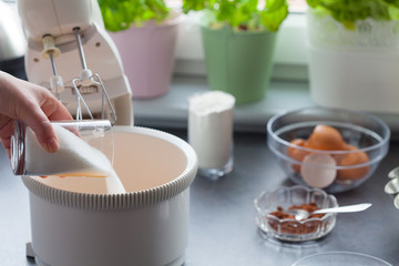 Baking cake. Next stages, following stages. We add sugar.