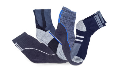 Several different men's thermal socks and crew socks