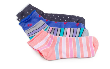 Several different women's socks on a white background