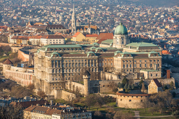 Fototapeta na wymiar Buda Castle or Royal Palace in Budapest, Hungary Lit by Setting Sun
