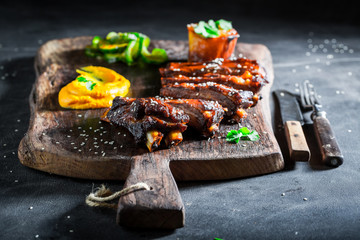 Delicious roasted ribs with vegetables and potato