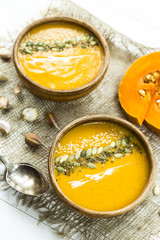 traditional autumn dish for Thanksgiving - pumpkin soup with garlic.