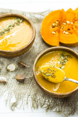 traditional autumn dish for Thanksgiving - pumpkin soup with garlic.