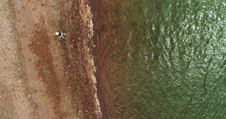 top view of sea water and rocks of beach. whild beach
