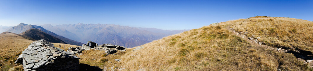 Mountain panorama in wide format over the italian alps in piedmont