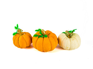 Three pumpkins isolated on white background