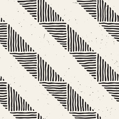 Hand drawn style ethnic seamless pattern. Abstract geometric tiling background in black and white.