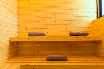 Sauna spa room of interior traditional wooden luxury golden background classic with towel
