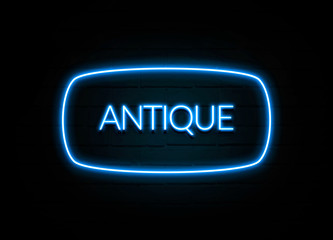 Antique  - colorful Neon Sign on brickwall