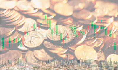 The conceptual multi exposure image of investment, financial and real estate market with gold coin, stock chart and building as represented symbols. The background image for investment market