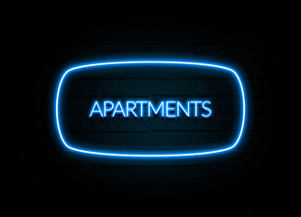 Apartments  - colorful Neon Sign on brickwall
