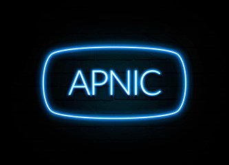 Apnic  - colorful Neon Sign on brickwall